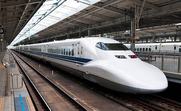 "Osaka, Japan - June 29, 2007: Noizomi Shinkansen at the Shin-Osaka Station in Osaka, Japan. This is a 700 series train type built between 1997 and 2006 and travel at a maximum speed of 270 km/h."
